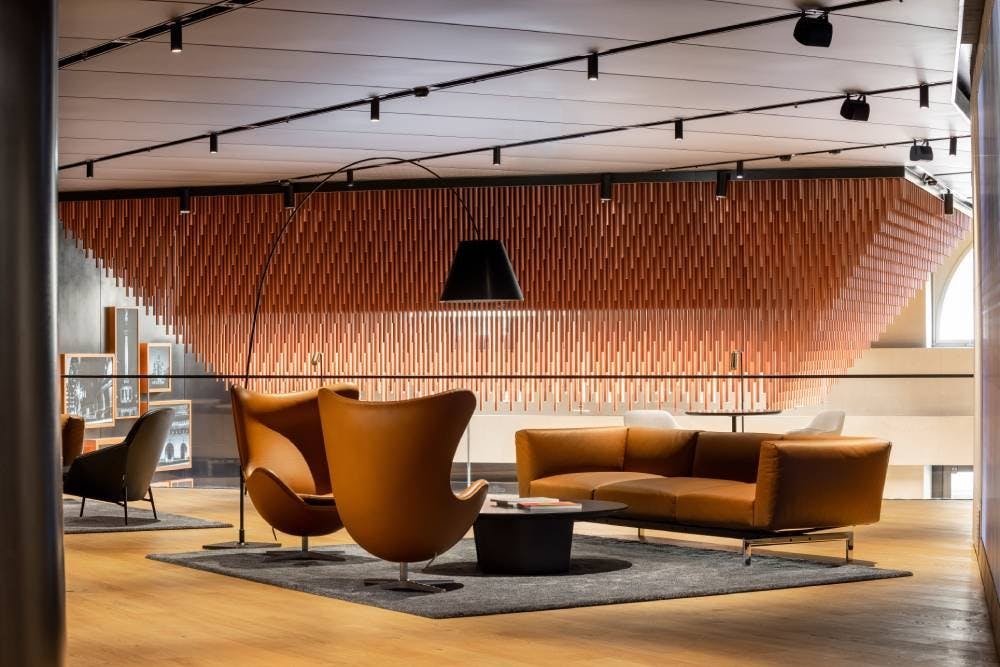 Alliant beauté et confort, les clients se sentent comme chez eux au studio Genesis de Zurich.