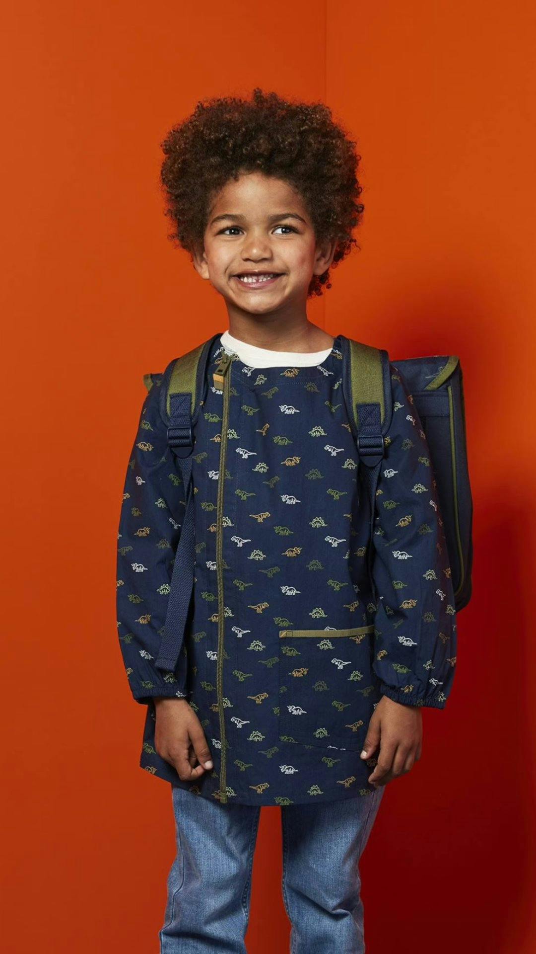 Malkittel mit Dinosauriern, personalisierbar, -25 Prozent, 18.71 Franken statt 24.95 Franken.