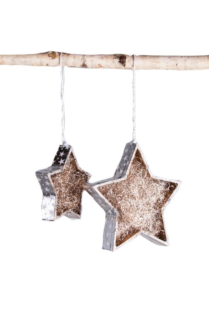 Karton, nicht Zimt
Sterne aus FSC-Karton,
12 Stück, 22.95 Franken, bei