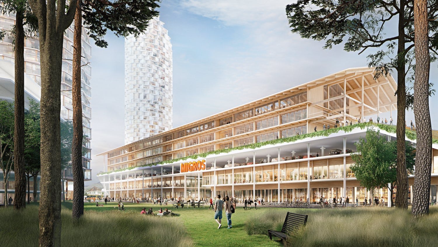 Im Dreispitz Nord werden verschiedene Nutzungen übereinander gestapelt: Der Bestandsbau der Migros bleibt erhalten, wird umgebaut, erweitert mit Läden...